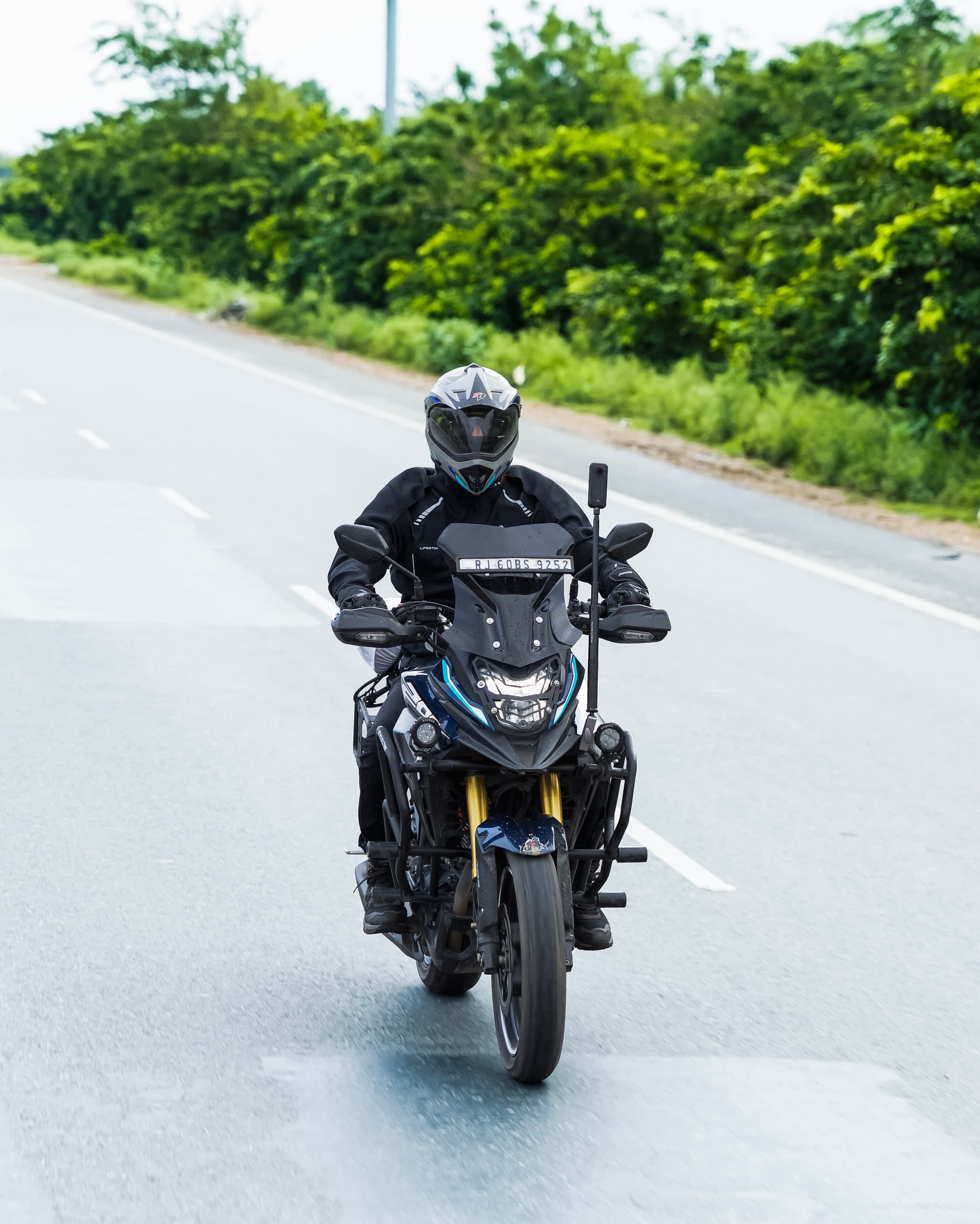 Rider head-on in the middle of a dual carriageway