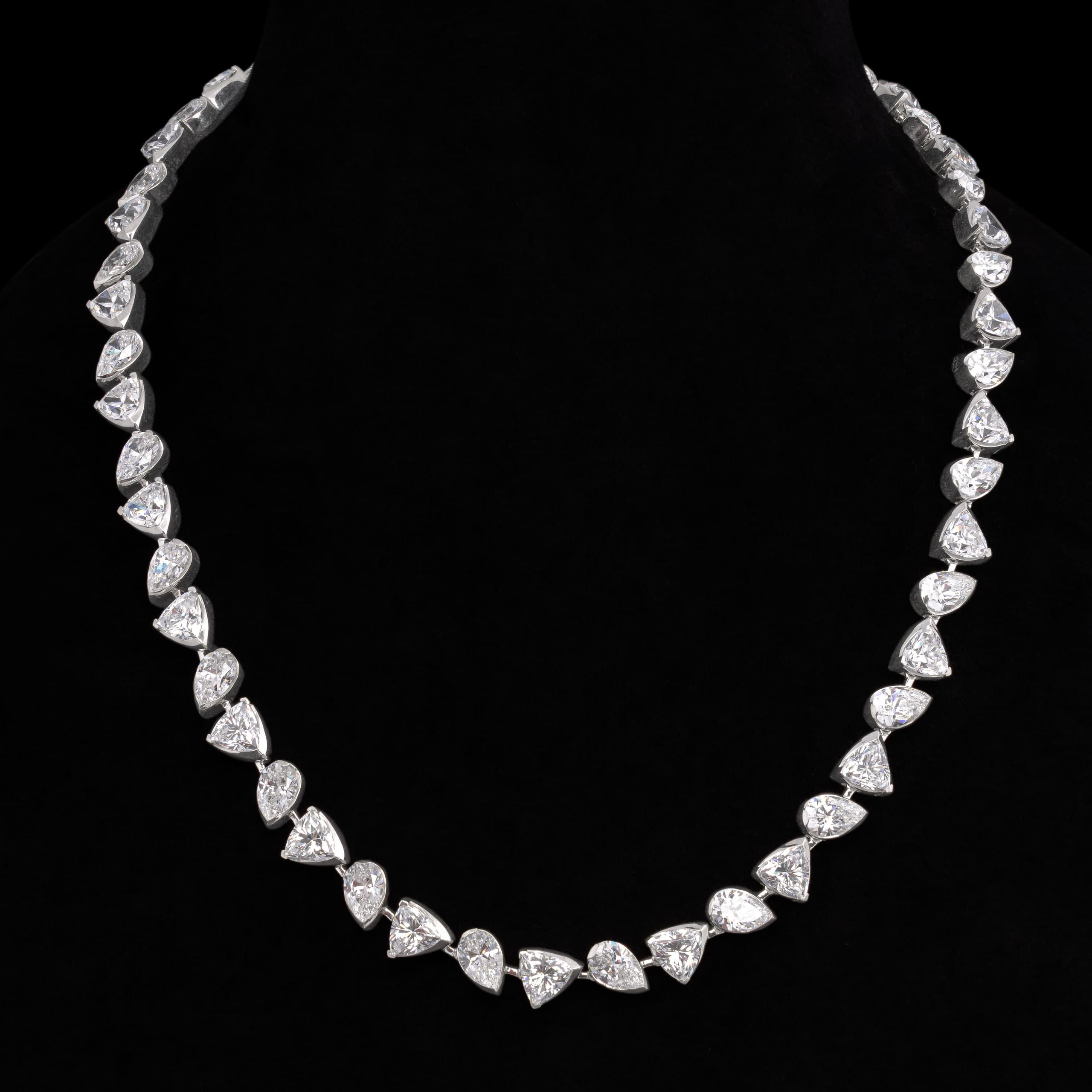 Necklace of graduated diamond hearts on black
