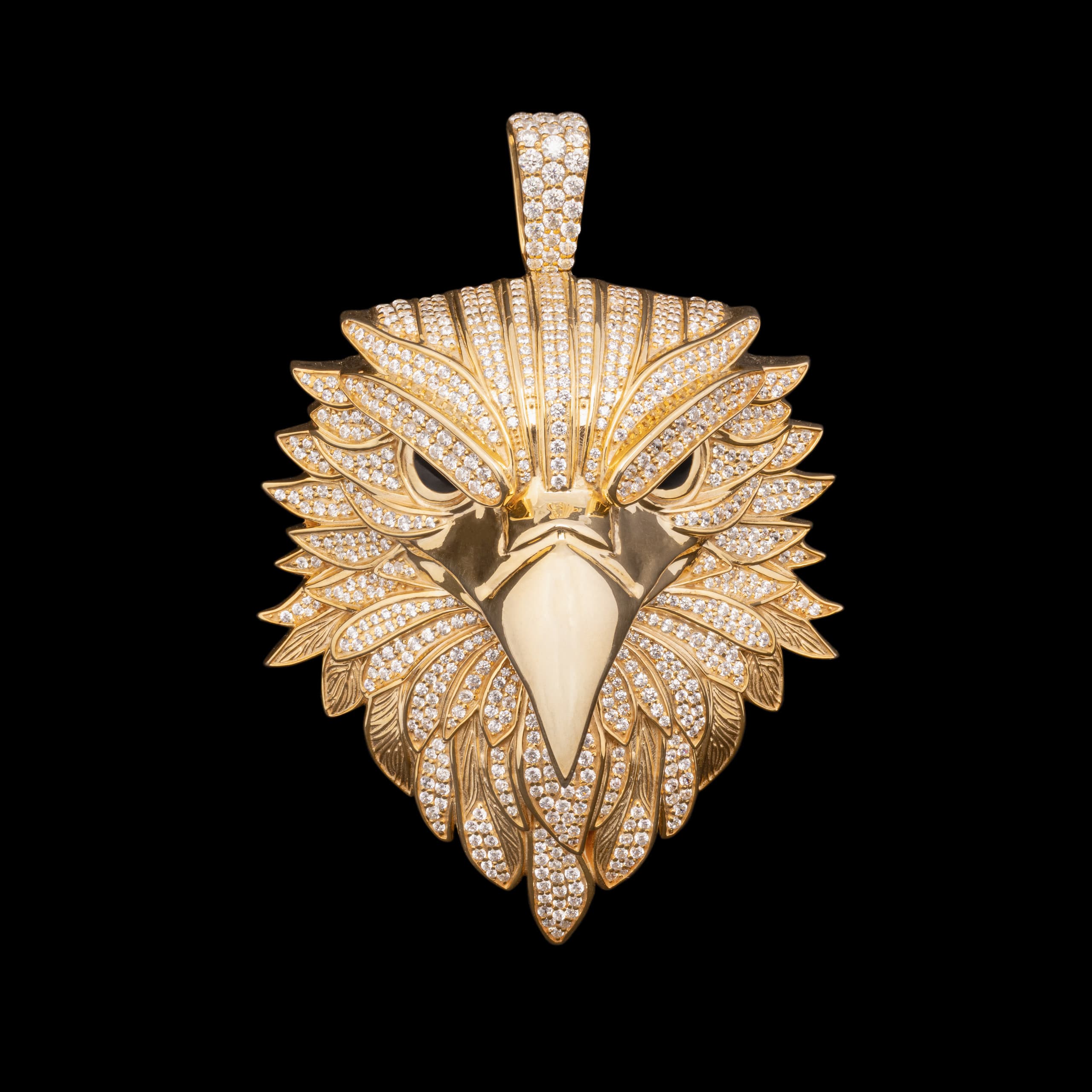 White-gold eagle head, every feather picked out in pavé